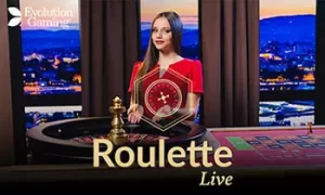 Female live dealer hosting blackjack at PHMYSTIC casino